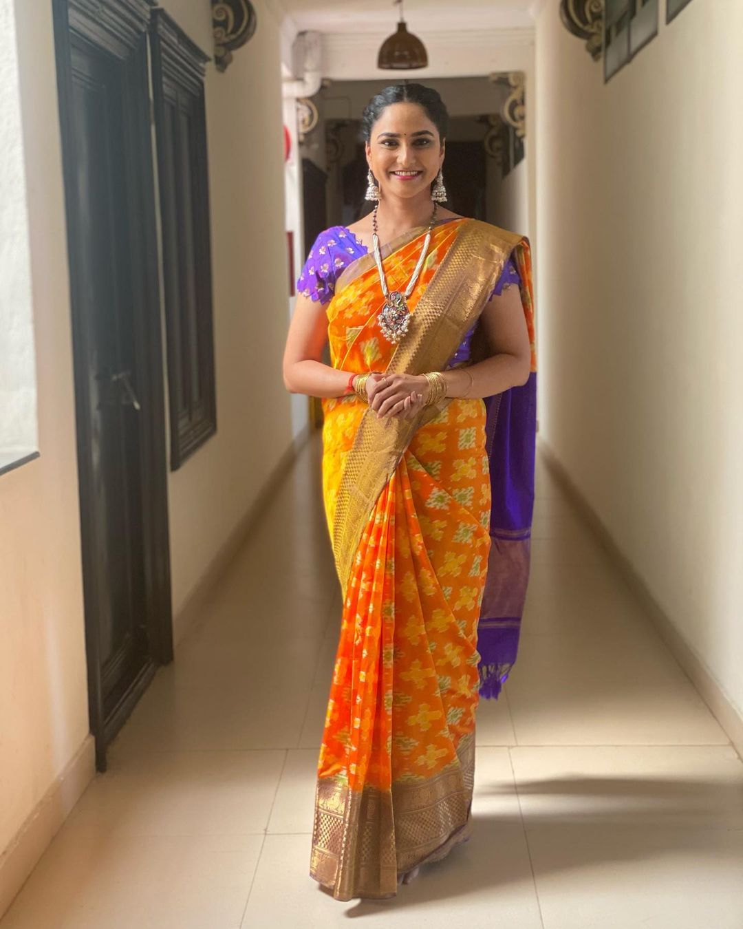 Telugu Tv Anchor Kasi Annapurna Stills in Orange Saree